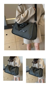 Detail showing high-capacity travel fitness bag with water-resistant nylon and adjustable straps