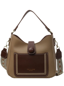 Retro khaki and brown shoulder bucket bag with stylish geometric strap on white background