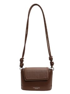 Vintage brown textured leather crossbody bag with knot strap and white lettering print