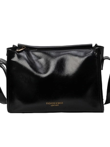 Sac polochon en cuir noir minimaliste avec logo doré et bandoulière réglable