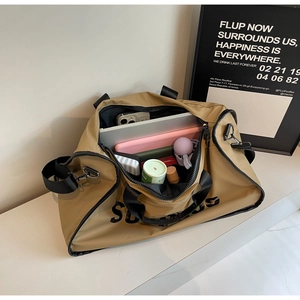 Interior view showing the large capacity and laptop compartment of the travel bag