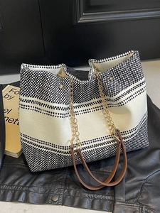Chic black and white geometric canvas tote bag with gold chain leather straps