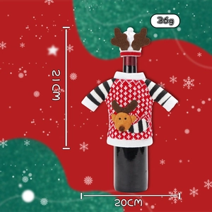 Detail of knitted Christmas elk wine bottle cover showing 21cm height and 20cm width size