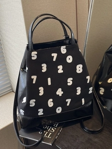 Sac à dos polyvalent en toile noire et cuir avec motifs numériques pour le quotidien
