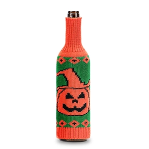 Close-up of knitted Halloween wine bottle cover with orange pumpkin and green accents