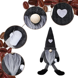 Close-up of heart-patterned knitted hat and textures on coffee gnome plush ornament