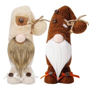 Pair of coffee-themed plush gnomes with beans and Nordic style holiday ornaments