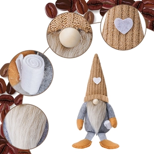 Close-up of heart knit pattern and soft faux fur texture on coffee gnome doll decor