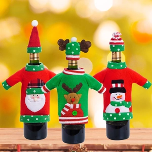 Set di tre copribottiglie natalizi con motivi di Babbo Natale, Renna e Pupazzo di neve