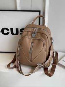 Elegant camel faux leather backpack with woven strap and multiple zipper pockets