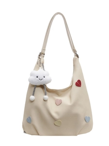 Grande borsa tote in tela beige con toppe a cuore colorate e ciondolo a nuvola