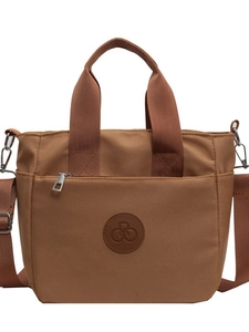 Sac fourre-tout en toile marron avec poche zippée et bandoulière réglable pour le quotidien