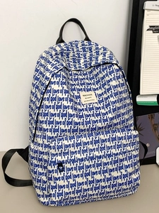 Large capacity off-white backpack with blue text print and durable black straps