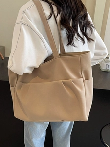 Minimalist large capacity tote bag with multi-pocket design for daily commuting and school