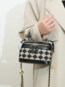 Chic quilted leather chain handbag with scarf-wrapped handle and bicolour textile panels
