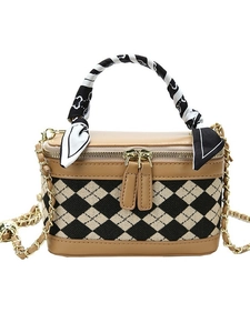 Vintage box-shaped quilted handbag with silk scarf and gold chain crossbody strap