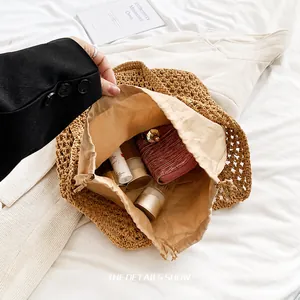 Spacious interior of woven cotton tote bag with drawstring lining and daily essentials
