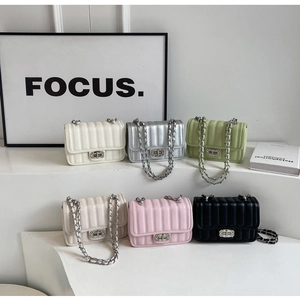 Detailed collection of quilted leather crossbody bags with diamond-encrusted twist locks