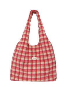 Minimalist red checkered tote bag with soft fabric texture and a chic center logo label