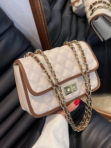 Borsa a tracolla trapuntata con catena dorata e chiusura a girello in crema e marrone