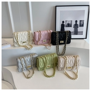 Detailed display of quilted chain bags in six colors including white, pink and silver