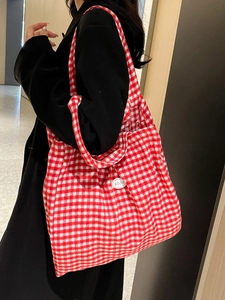 Large red and white gingham tote bag for women with a minimalist shoulder strap design