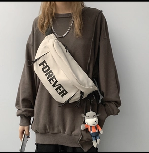 Off-white canvas crossbody bag with FOREVER lettering and cute calf plush keychain