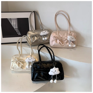 Group shot of vintage bowling bags in silver pink beige and black with cute cloud charms