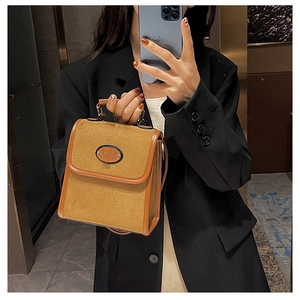 Retro brown faux suede crossbody bag with NICE FASHION logo and top handle detail