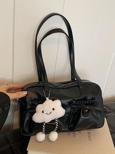 Vintage black bowling bag with bow pockets and a cute plush cloud charm detail
