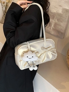 Creamy white vintage bowling bag with ribbon bows and cloud plush charm for women