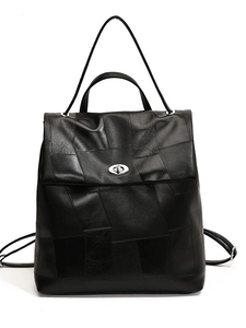 Minimalist black patchwork leather backpack with silver turn-lock and top handle