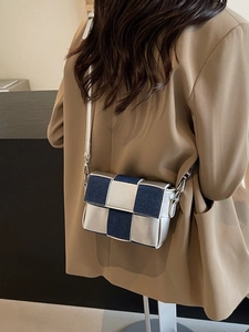 Modern silver checkerboard crossbody bag with denim patchwork and adjustable strap