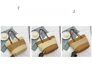 Detailed view of three large straw tote bags with different woven color-block patterns