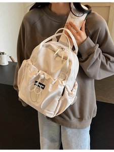 Lightweight mini nylon backpack for women in beige with adjustable straps by YOUJI BEAR