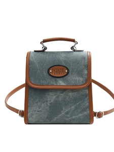Vintage denim and leather mini backpack with top handle and adjustable straps