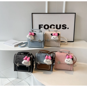 Detailed collection of five mini faux leather backpacks with star charms and plush toys