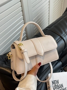 Elegant cream white faux leather crossbody square bag with gold buckle and top handle
