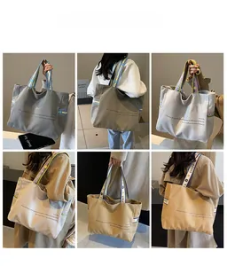 Detailed grid view of large canvas tote bags with printed straps and minimal design