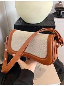 Retro half-moon shoulder bag in brown leather and beige canvas with adjustable strap