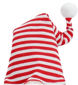 Detail of red and white striped Christmas hat with a soft white plush pom-pom tip