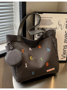 Dark grey canvas tote bag with colorful letter embroidery and small round coin purse