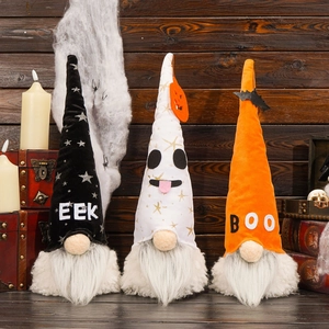 Three-piece set of glowing Halloween gnomes with EEK and BOO prints on rustic wooden background