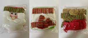 Three-piece Christmas bottle cover set featuring Santa, snowman and reindeer designs