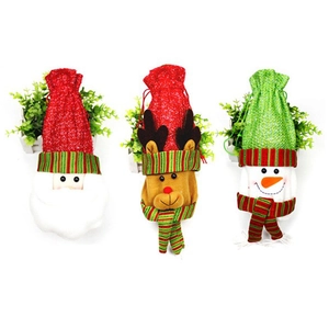 Three-piece Christmas wine bottle covers featuring Santa Claus, Reindeer and Snowman