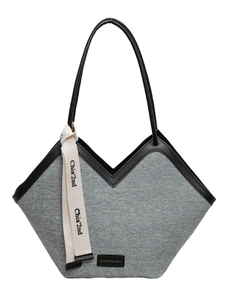 Sac fourre-tout en jean tricoté avec bordure en V profonde et anses en cuir noir