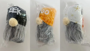 Detailed view of Halloween gnome plush set with EEK and BOO text in packaging
