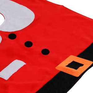 Detail of Christmas toilet cover featuring Santa suit elements and plush fabric texture