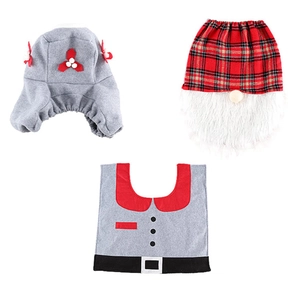 Detailed view of 3-piece Christmas gnome toilet seat covers in red plaid and grey fabric