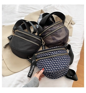 Three assorted nylon saddle bags with camo and geometric patterns and wide fashion straps